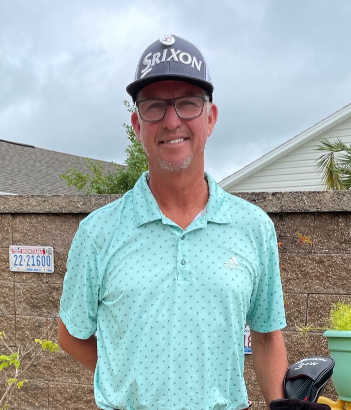 Oxford Golf Academy staff member at the range